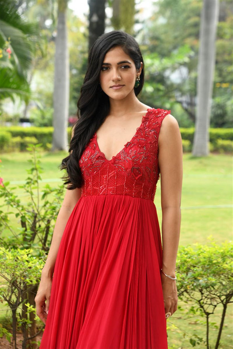 Telugu Actress Simran Choudhary in Red Dress at Atharva Movie Press Meet